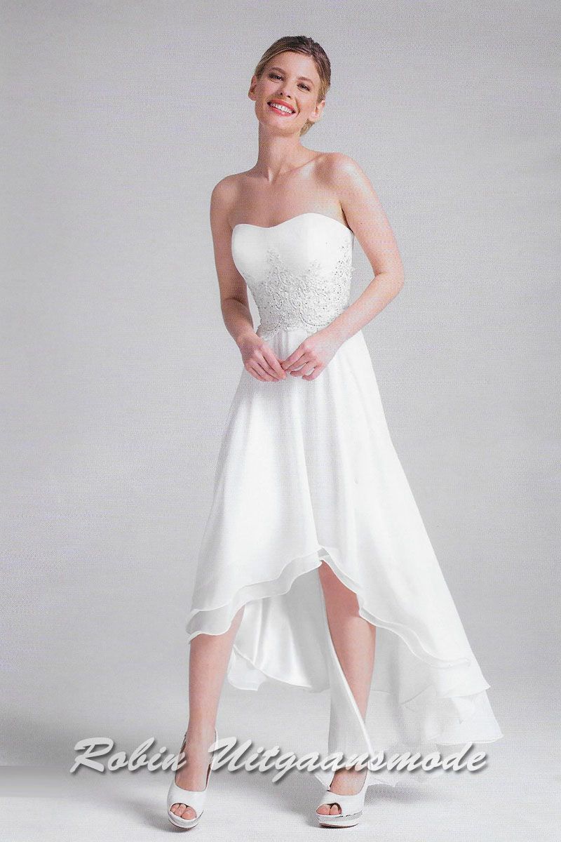 High-low wedding dress with sequin applications on the bodice
